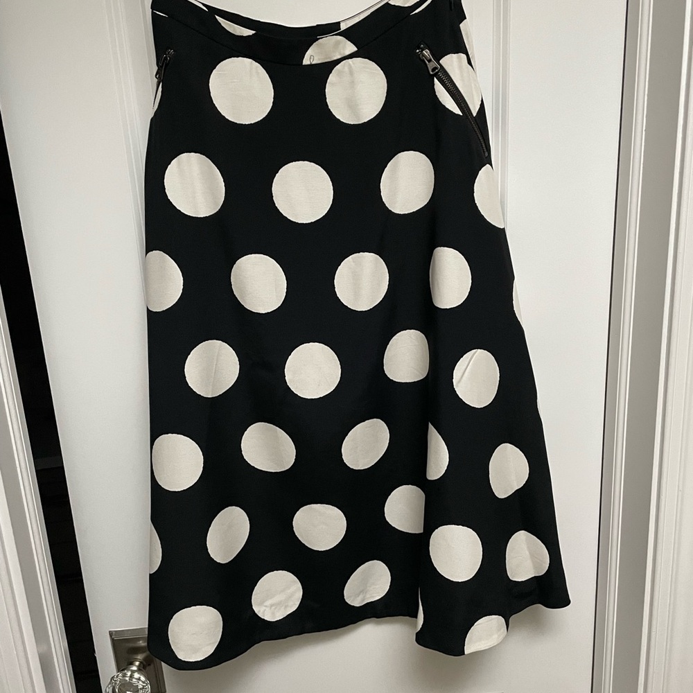Anthropologie black and white polka dot midi skirt with pockets